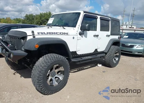 2011 Jeep Wrangler Unlimited Rubicon z USA, uszkodzony, nr VIN 1J4BA6H10BL536027